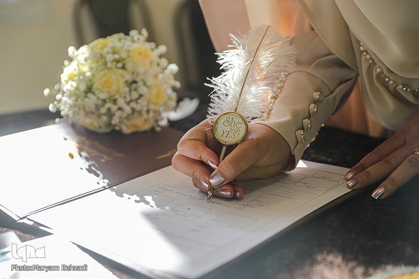 مراسم عقد زوجین جوان در جوار حرم مطهر حضرت شاهچراغ علیه السلام، به‌مناسبت میلاد خجسته مولود کعبه