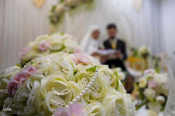 برگزاری مراسم عقد ازدواج جمعی از جوانان، به‌مناسبت ولادت باسعادت امام حسن مجتبی(ع)