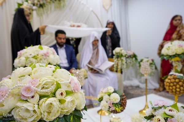 برگزاری مراسم عقد ازدواج جمعی از جوانان، به‌مناسبت ولادت باسعادت امام حسن مجتبی(ع)